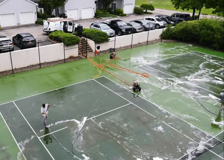New Franklin Power Washing professional cleaning outdoor surfaces at New Franklin property